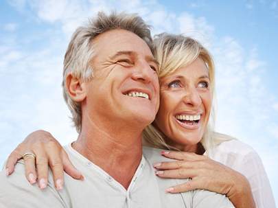 Lady holding her man smiling